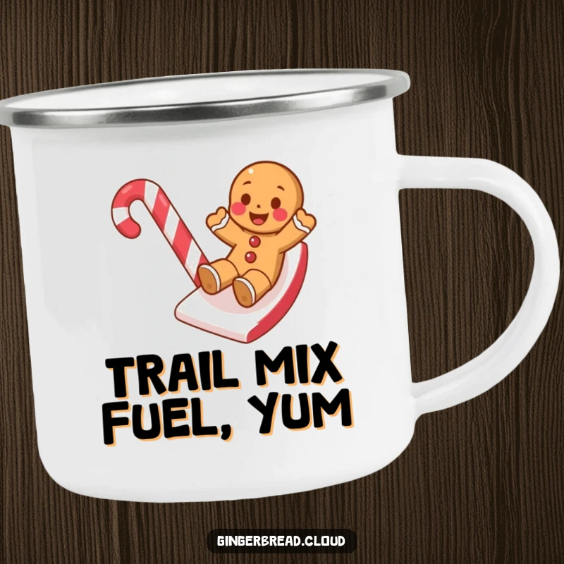 Funny camping mug showing a gingerbread cookie on a candy cane slide, perfect for outdoor enthusiasts.