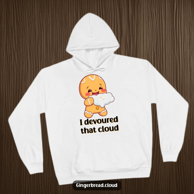 Cheerful gingerbread character taking a huge bite out of a cloud, featured on a cozy hoodie for warm and happy apparel.