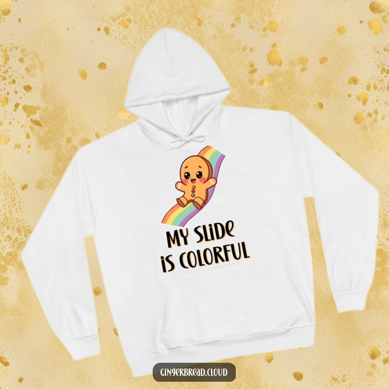 Funny hoodie showcasing a gingerbread cookie sliding down a rainbow with a surprised expression, offering cozy holiday spirit.