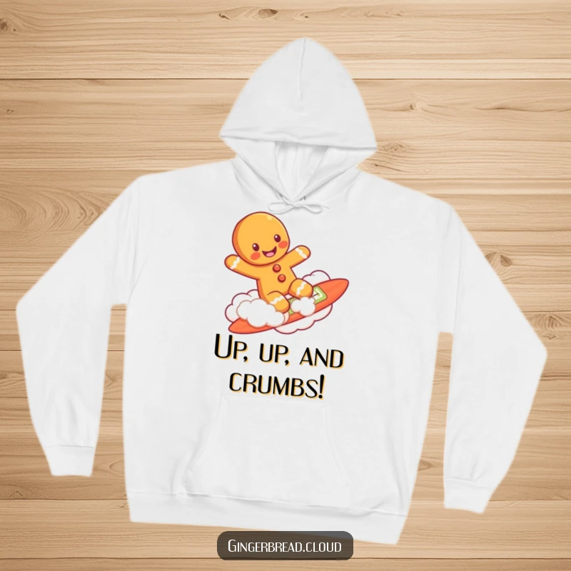 Funny gingerbread man surfing on a cloud like a surfboard, printed on a warm and cozy hoodie.